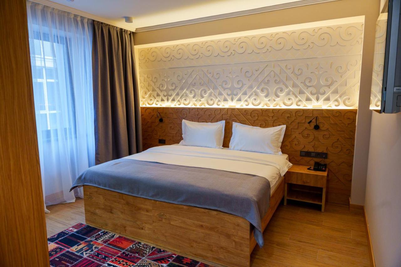 Dami Almaty Hotel Exterior photo